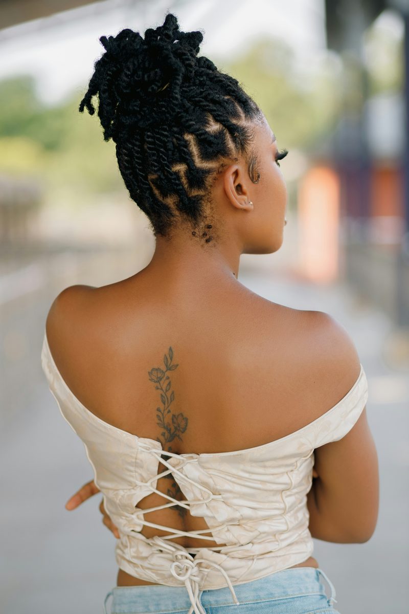 Protective updo styling by Jasmine Rivera in Tampa